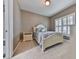 Cozy bedroom with shuttered windows, carpeted floor, and adjacent bathroom access at 535 Crested Hawk Rdg, Canton, GA 30114