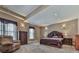 Spacious main bedroom with a seating area and two large windows providing ample natural light at 535 Crested Hawk Rdg, Canton, GA 30114
