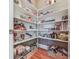 Well-organized pantry with ample shelving for easy storage, perfect for keeping kitchen essentials in order at 535 Crested Hawk Rdg, Canton, GA 30114