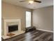 Living room with fireplace and hardwood floors at 6401 Wedgeview Ct, Tucker, GA 30084