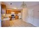 Galley style kitchen with wood cabinets and appliances at 1696 Winchester Se Way, Conyers, GA 30013