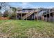 Spacious backyard with elevated deck and stairs leading to home at 774 Tift Sw Ave, Atlanta, GA 30310