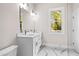 Bathroom with double vanity and marble flooring at 774 Tift Sw Ave, Atlanta, GA 30310
