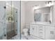Elegant bathroom with double vanity, marble shower, and modern fixtures at 774 Tift Sw Ave, Atlanta, GA 30310