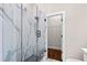 Modern bathroom with a large walk-in shower and marble tile at 774 Tift Sw Ave, Atlanta, GA 30310