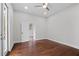 Spacious bedroom with hardwood floors and door to exterior at 774 Tift Sw Ave, Atlanta, GA 30310