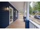 Inviting front porch with white railings and a view of the street at 774 Tift Sw Ave, Atlanta, GA 30310