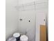 Functional laundry room with built-in shelving and space for storage at 774 Tift Sw Ave, Atlanta, GA 30310