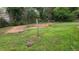 The backyard is spacious and features a large grassy area, with partial fencing at 992 Brian Ln, Forest Park, GA 30297