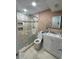 Well-lit bathroom with a walk-in shower, modern vanity, and neutral color scheme at 992 Brian Ln, Forest Park, GA 30297