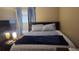 Comfortable bedroom featuring a large window and modern decor at 992 Brian Ln, Forest Park, GA 30297