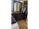 Bedroom closet with lots of storage space and dresser with large mirror at 992 Brian Ln, Forest Park, GA 30297