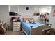 Bright bedroom with twin bed, side tables, natural light and plenty of closet space at 992 Brian Ln, Forest Park, GA 30297