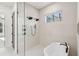 Stylish bathroom featuring a glass enclosed shower, modern fixtures, and relaxing ambiance at 1820 Lake Dow Rd, Mcdonough, GA 30252