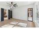 Spacious bedroom featuring a ceiling fan, natural light, and an en-suite bathroom at 1820 Lake Dow Rd, Mcdonough, GA 30252