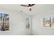 Cozy bedroom with two large windows offering natural light and scenic views at 1820 Lake Dow Rd, Mcdonough, GA 30252