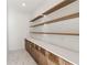 Well-organized pantry with custom cabinets, shelving, and ample counter space at 1820 Lake Dow Rd, Mcdonough, GA 30252