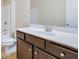 Bathroom with dark vanity, single sink and shower/tub combo at 2686 Caleb James Rd, Marietta, GA 30064