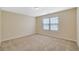 Simple bedroom with neutral walls and carpeted floors at 2686 Caleb James Rd, Marietta, GA 30064