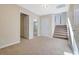 Upstairs hallway with carpet and doors to bedrooms at 2686 Caleb James Rd, Marietta, GA 30064