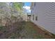Side view of house, showing deck and tree-lined backyard at 2686 Caleb James Rd, Marietta, GA 30064