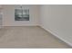 Bright living room featuring a large window and neutral decor at 2686 Caleb James Rd, Marietta, GA 30064