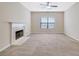 Living room with fireplace and a ceiling fan at 2686 Caleb James Rd, Marietta, GA 30064