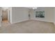 Spacious living room with neutral carpeting and large window at 2686 Caleb James Rd, Marietta, GA 30064