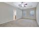 Main bedroom with ensuite bath access and ceiling fan at 2686 Caleb James Rd, Marietta, GA 30064