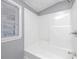 Bathroom with shower and tub, neutral walls at 281 Valley Lake Dr, Stone Mountain, GA 30087