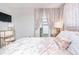 Spacious bedroom with walk-in closet and plush bedding at 3040 Peachtree Rd # 1010, Atlanta, GA 30305