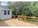 Spacious wooden deck featuring wooden railings and metal wire; perfect for entertaining outdoors at 641 Virginia Ave, Suwanee, GA 30024