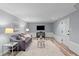 Finished basement area featuring recessed lighting, luxury vinyl plank, and a comfortable seating area at 641 Virginia Ave, Suwanee, GA 30024