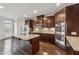 Elegant kitchen boasts granite countertops, a center island, and stainless steel appliances at 4196 Morrison Way # 11, Atlanta, GA 30341