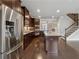 Modern kitchen featuring granite countertops, a large island, stainless steel appliances and hardwood floors at 4196 Morrison Way # 11, Atlanta, GA 30341