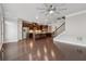 Open-concept kitchen with dark cabinets, stainless steel appliances, and center island at 4196 Morrison Way # 11, Atlanta, GA 30341