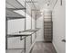 A walk-in closet featuring installed shelving, closet rods and drawers for optimal storage at 4196 Morrison Way # 11, Atlanta, GA 30341