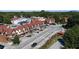 Aerial view of a charming commercial district featuring Tudor-style buildings, walkable streets, and ample parking at 812 Stratford Rd, Avondale Estates, GA 30002