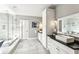 Bright bathroom featuring double sinks, sleek cabinetry, and a glass enclosed shower at 812 Stratford Rd, Avondale Estates, GA 30002