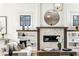 Bright living room with fireplace, hardwood floors, and lots of natural light at 812 Stratford Rd, Avondale Estates, GA 30002