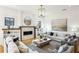 Bright living room with fireplace, hardwood floors, and lots of natural light at 812 Stratford Rd, Avondale Estates, GA 30002