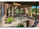 Charming outdoor patio with comfortable seating, string lights, and a fireplace, ideal for relaxed dining and socializing at 812 Stratford Rd, Avondale Estates, GA 30002
