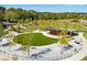 Scenic park view featuring walking paths, a bandstand, grassy areas, and mature trees providing ample shade at 812 Stratford Rd, Avondale Estates, GA 30002