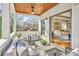 Comfortable screened porch with seating, beautiful views, and access to the main bedroom at 812 Stratford Rd, Avondale Estates, GA 30002