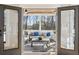 Comfortable screened porch with seating and beautiful view at 812 Stratford Rd, Avondale Estates, GA 30002
