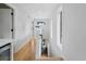 Light-filled hallway with hardwood floors and overhead lighting at 139A Walthall Se St, Atlanta, GA 30316