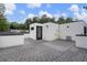 Private rooftop deck with gray pavers and access door at 139A Walthall Se St, Atlanta, GA 30316