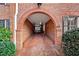 Charming arched entry with brick pavers adds architectural detail to the property at 3456 Paces Nw Pl, Atlanta, GA 30327