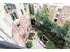 Aerial view of a courtyard with fountain and surrounding buildings at 2626 Peachtree Nw Rd # 706, Atlanta, GA 30305