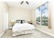 Spacious bedroom with large windows and ceiling fan at 2626 Peachtree Nw Rd # 706, Atlanta, GA 30305